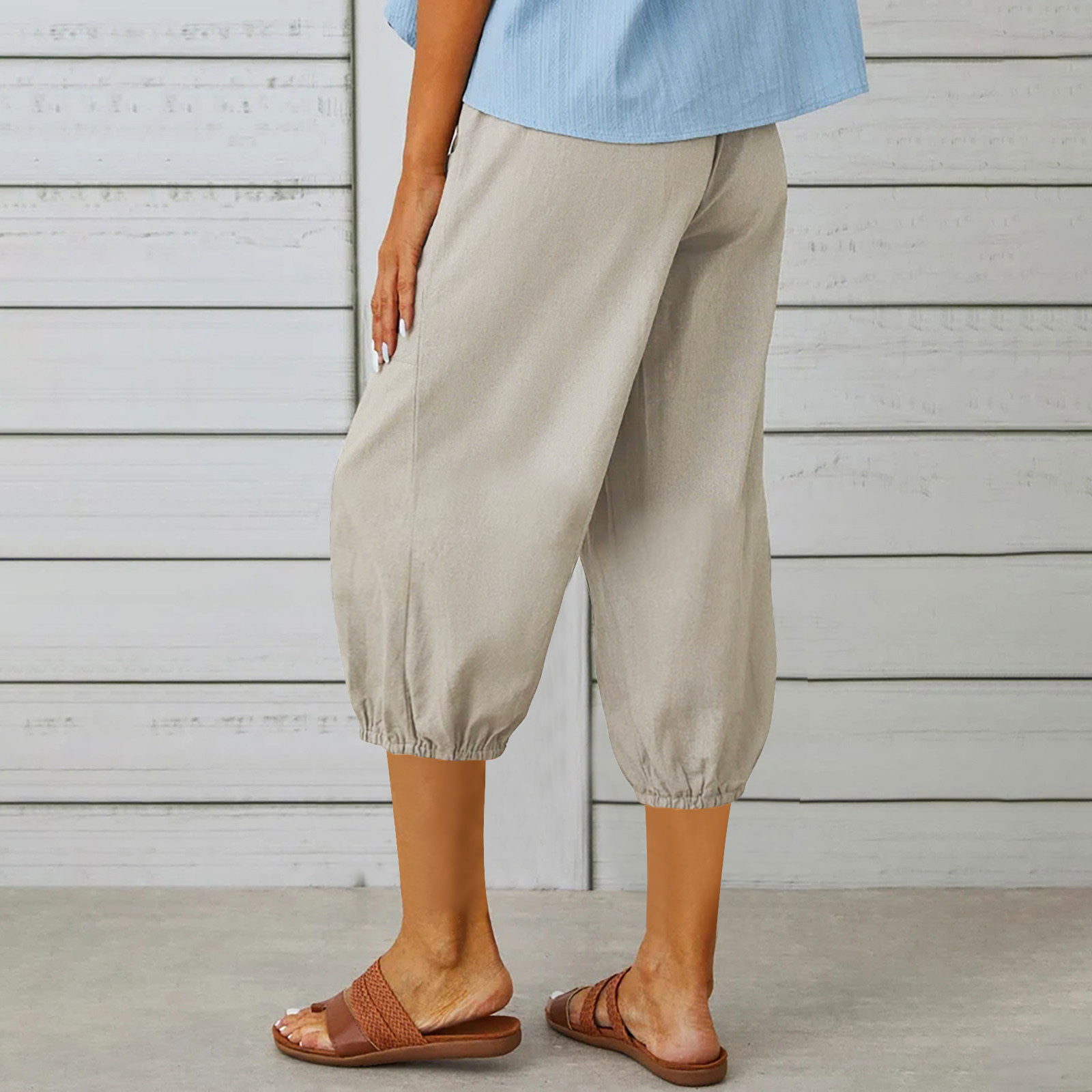 thumbnail image 4 of Pantalones harem elásticos de cintura alta y corte holgado para mujer: pantalones cortos informales con bolsillos, mezcla de algodón, diseño de color liso, 4 of 7